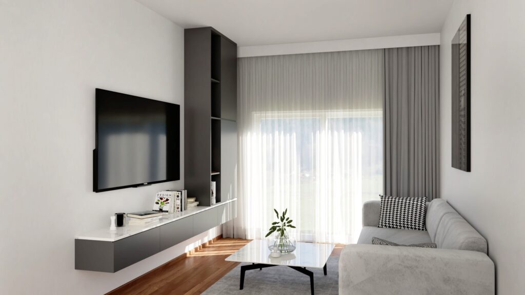 A living room complete with sofa and TV