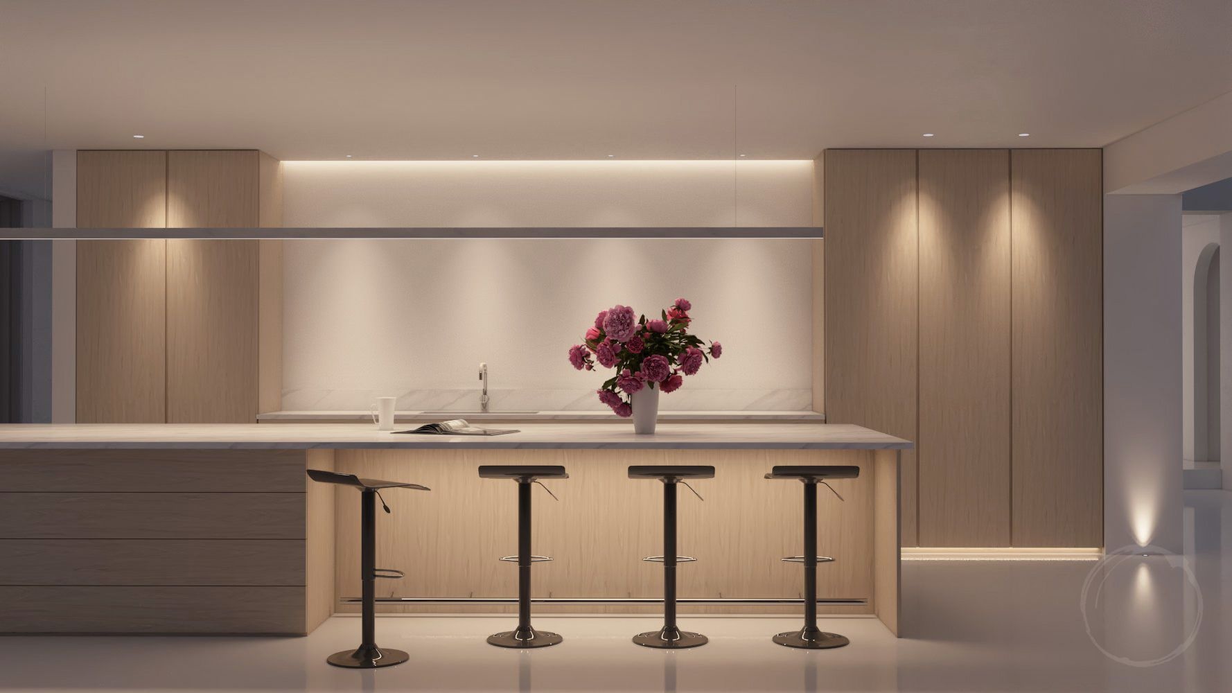 A vase of flowers at on a kitchen island with stools
