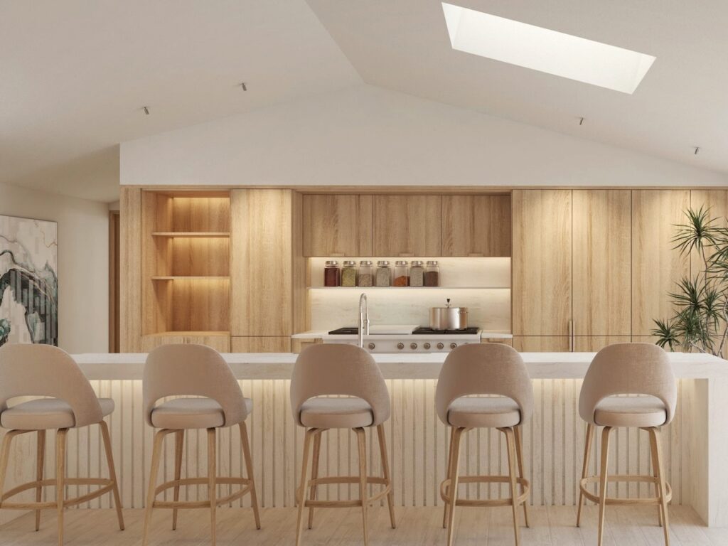 a light kitchen with 5 chairs sat at an island